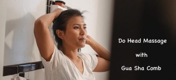 use gua sha comb to promote hair growth